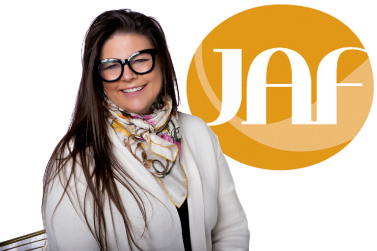 Judy A. Field smiling in a professional office setting